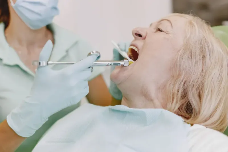 A patient sitting calmly in a dental chair